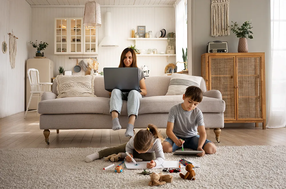 improved-air-quality a mother sitting with her kids in their lounge