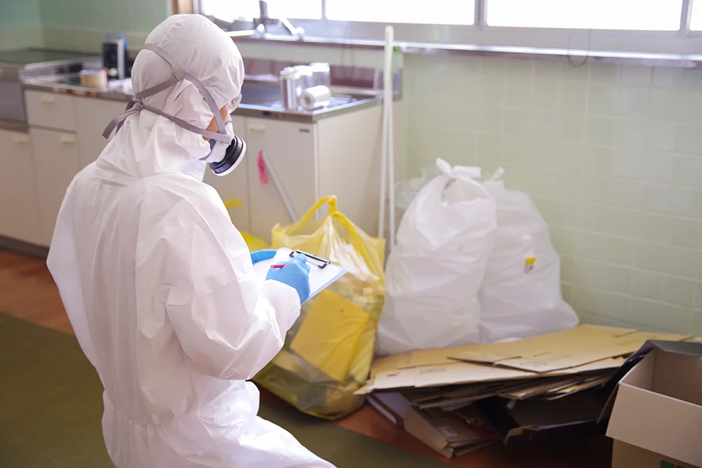 a bio hazard cleaner working on a crime scene