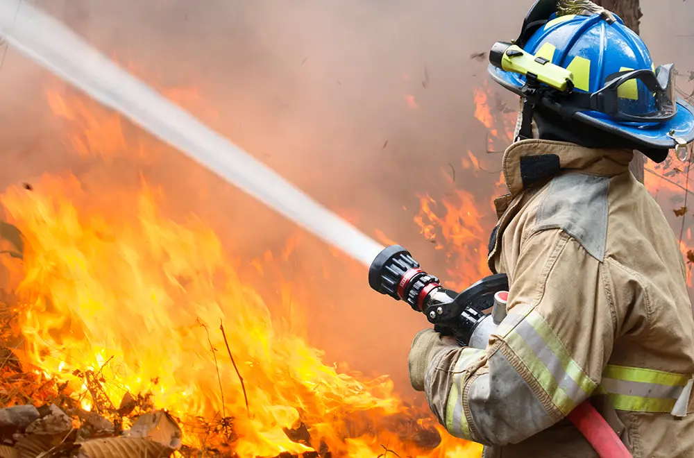 fire-fighters fire fighter fighting a fire