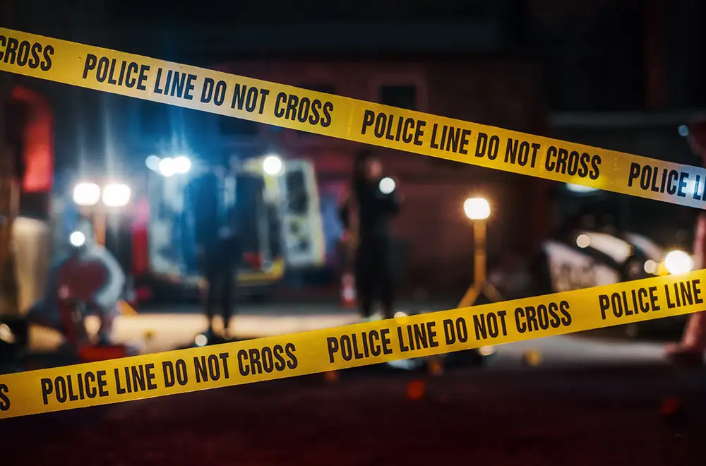 caution tapes infront of a crime scene