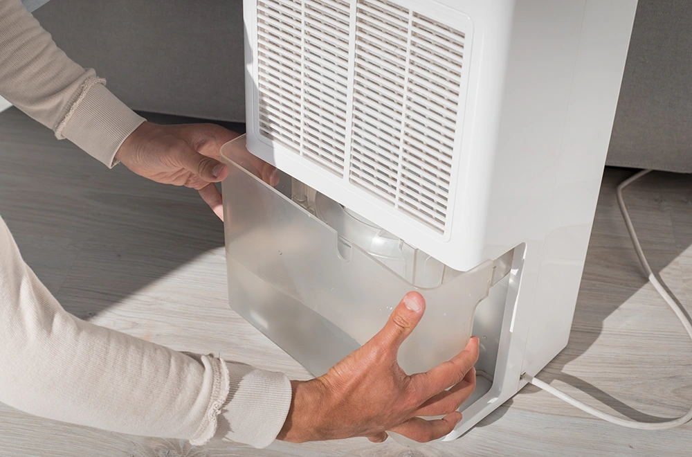 pulling out a humidifier tray