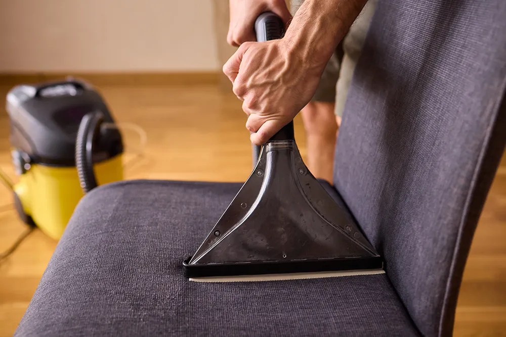 deep cleaning a chair to remove odor
